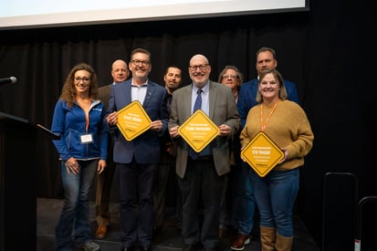 Sen. Scott Dibble and Rep. Frank Hornstein accept Infrastructure Champion Awards.