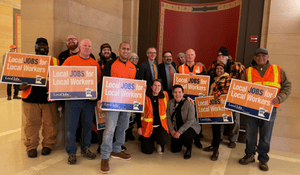 Group of Liuna members holding up signs that say "Local Jobs for Local Workers"
