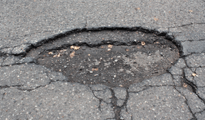A pothole in the street